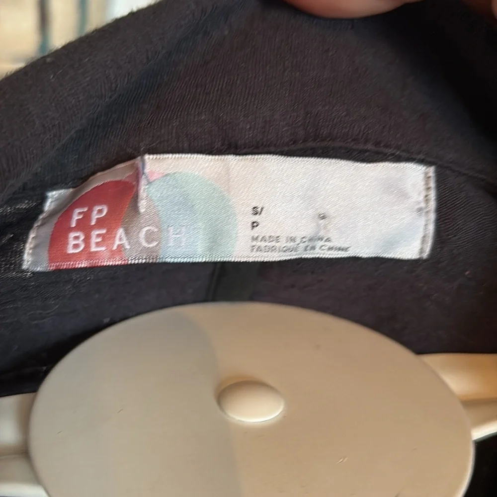 Free people Beach ruffle bottom dress/coverup. Worn‎ a few times
